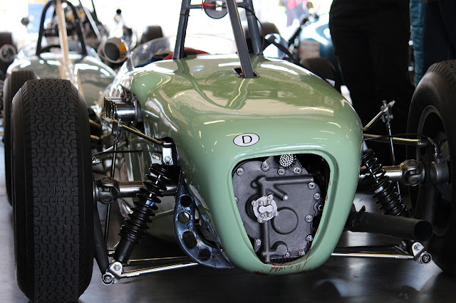 Christian Horner wearing Red Bull Racing team gear, looking serious and reflective in the team paddock after his departure announcement in July 2025