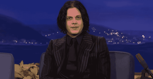 Jack White performing live during Echoes of Tomorrow 2025 album tour with guitar in hand.